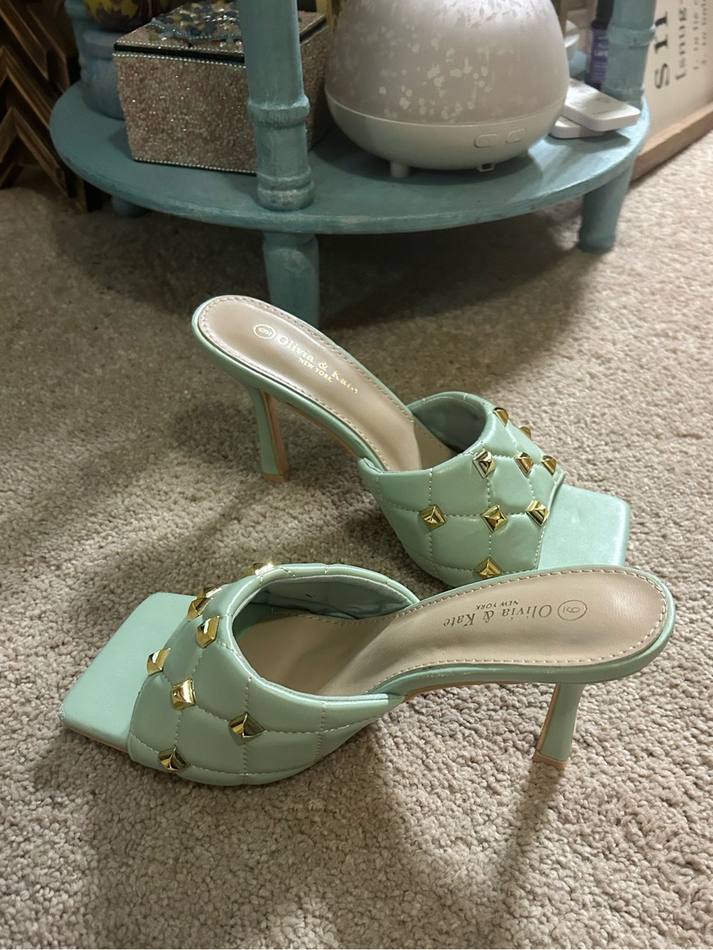 Mint green quilted slide sandals heels  with gold studs from Olivia & Kate
